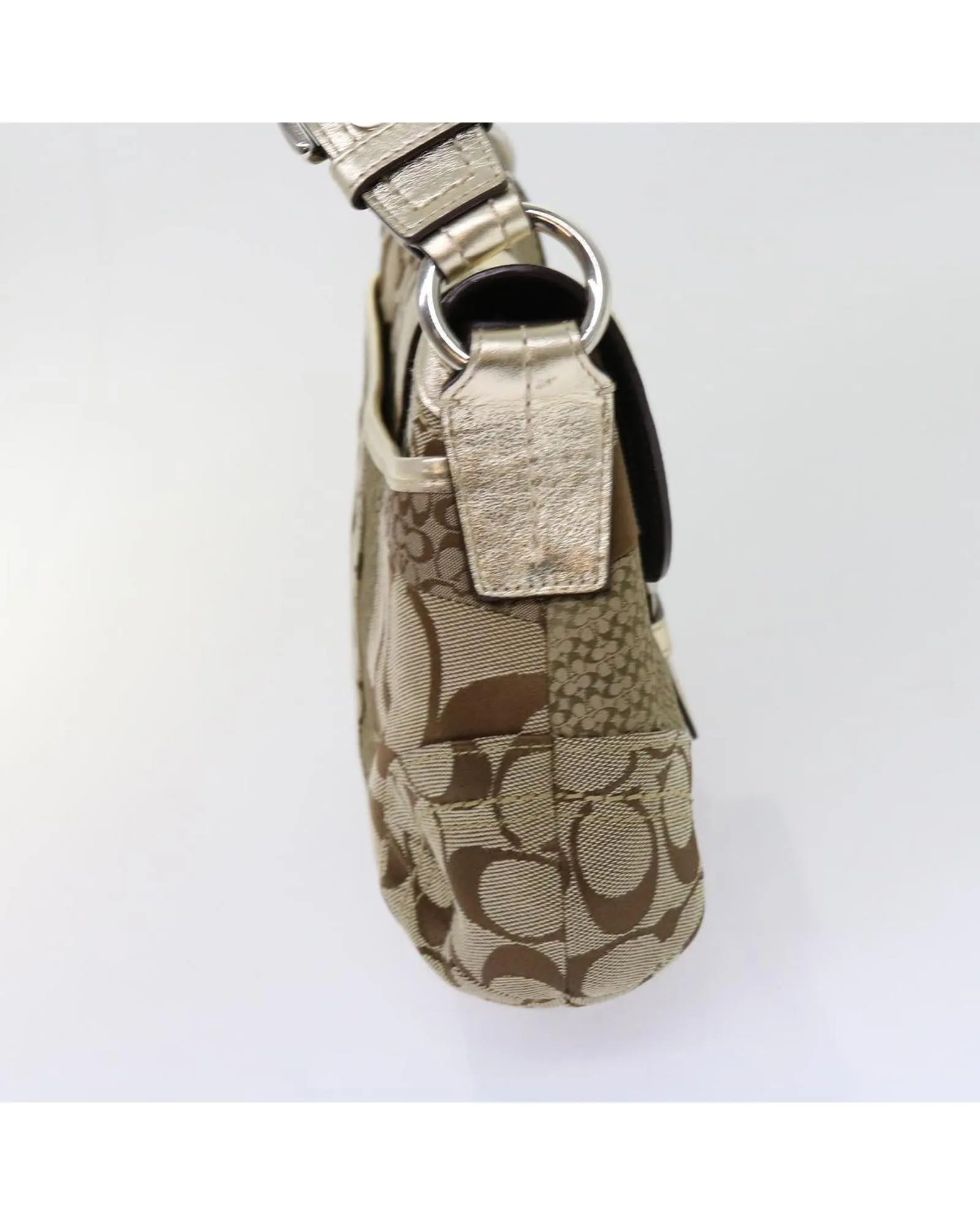 Beige Canvas Shoulder Bag with Leather Accents and Charm