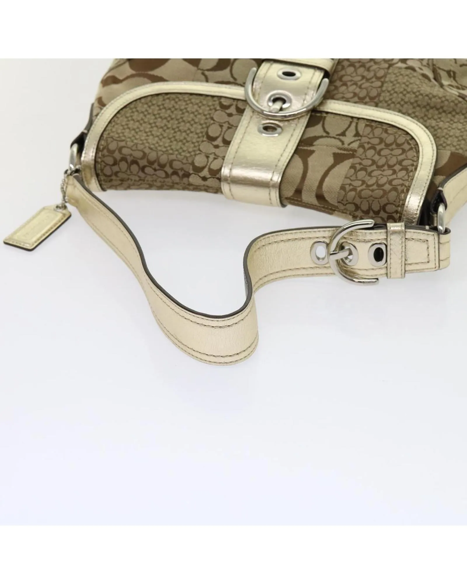 Beige Canvas Shoulder Bag with Leather Accents and Charm